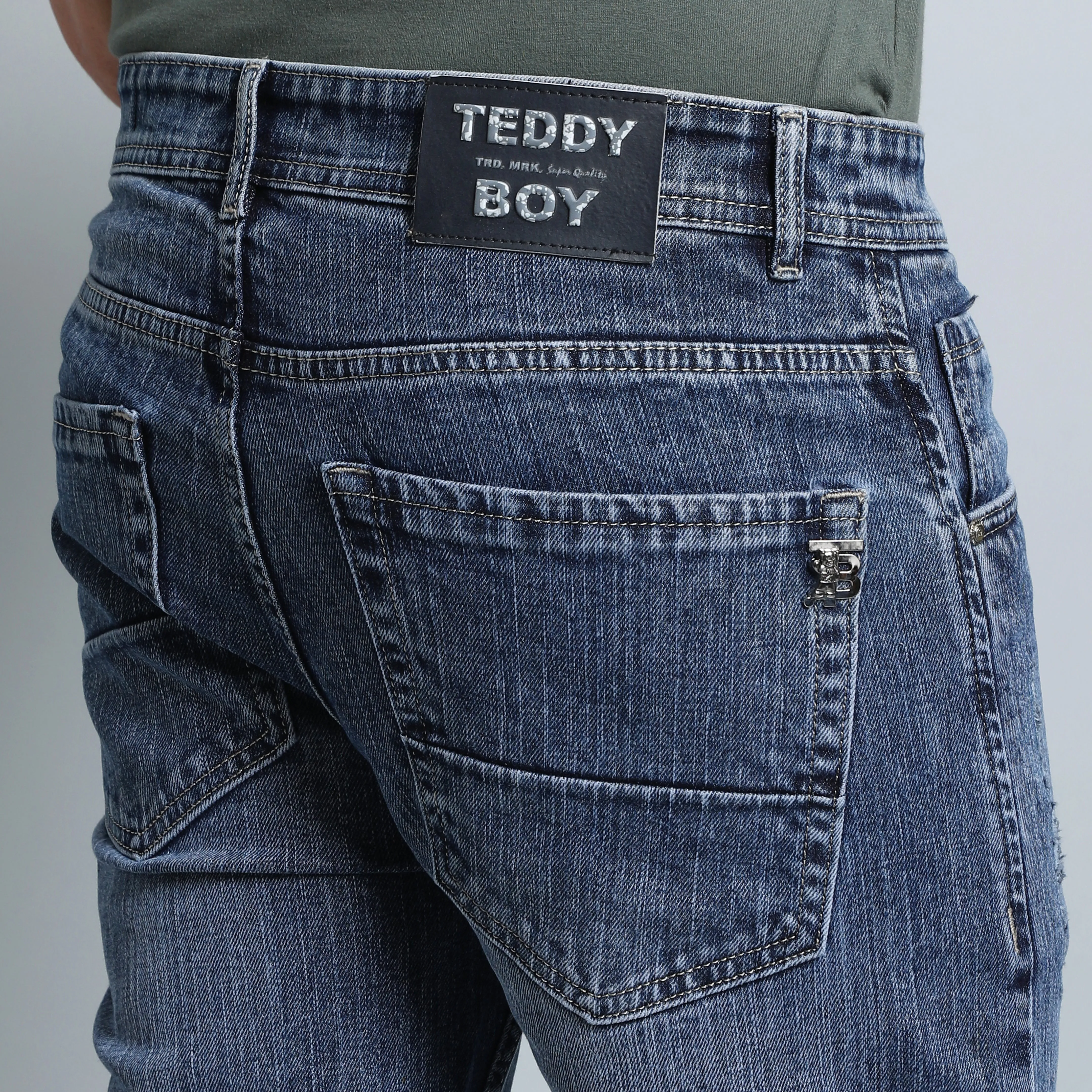 LIGHT GREY BAGGY FIT DISTRESSED JEANS TEDDY