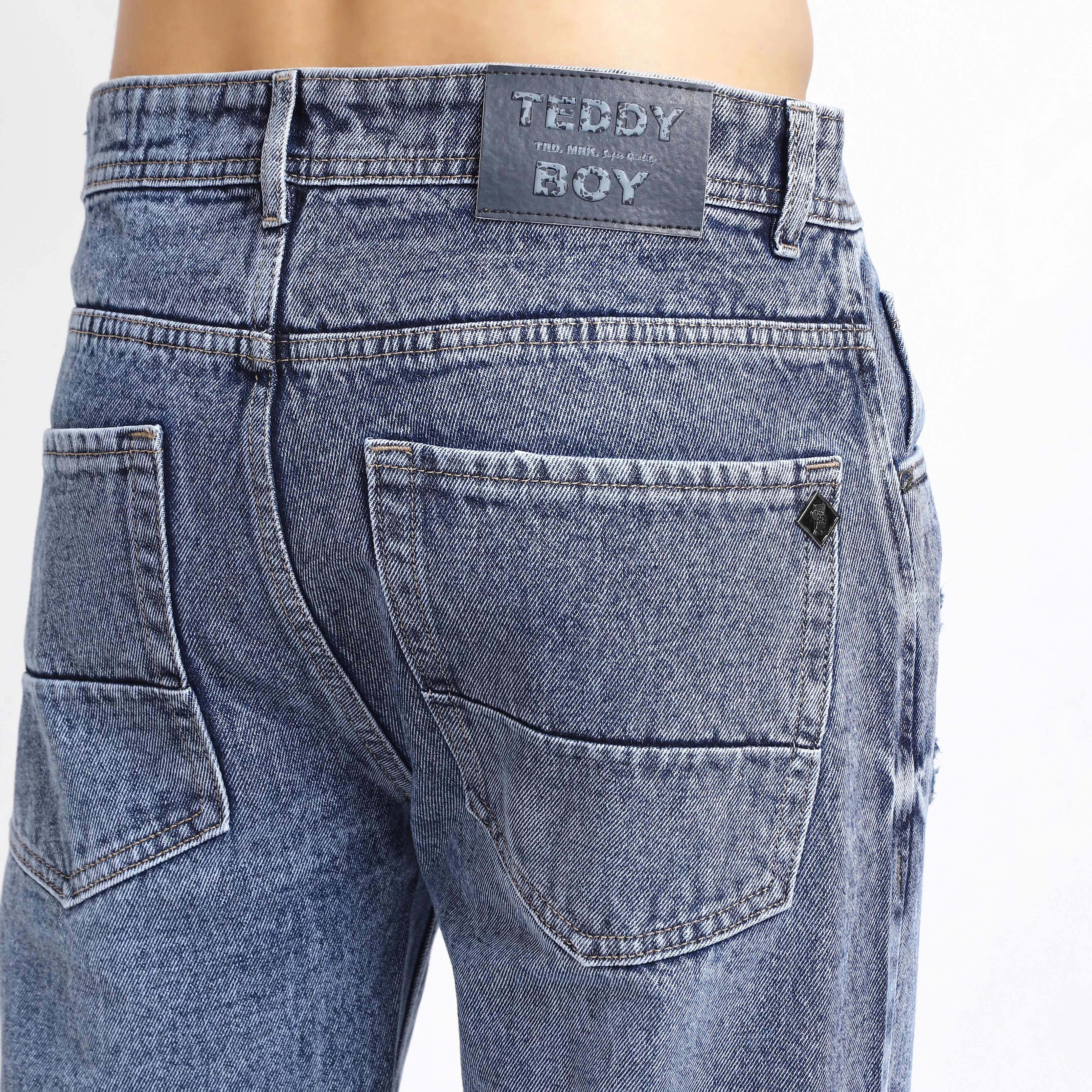 LIGHT BLUE BAGGY FIT DISTRESSED JEANS TEDDY