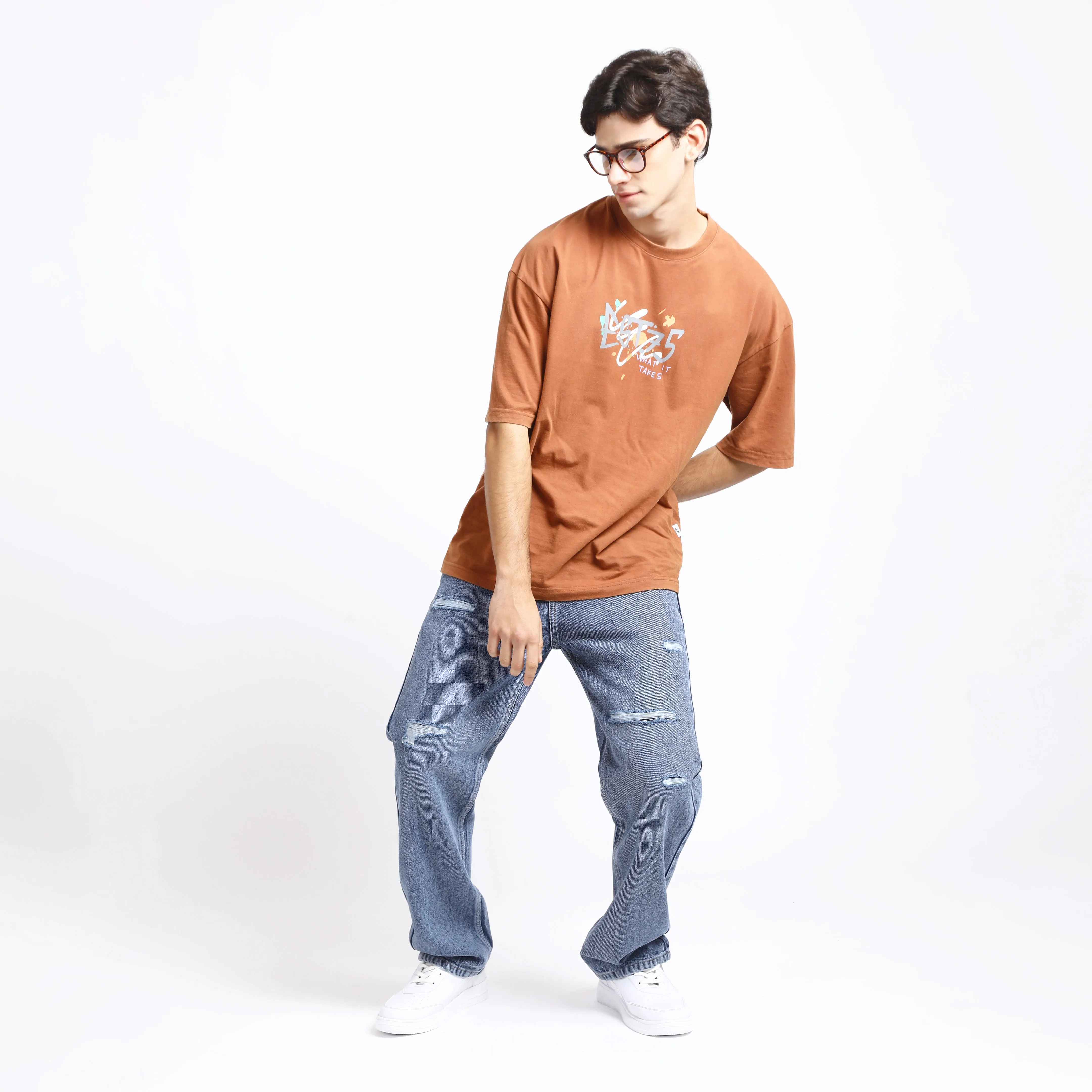 LIGHT BLUE BAGGY FIT DISTRESSED JEANS TEDDY