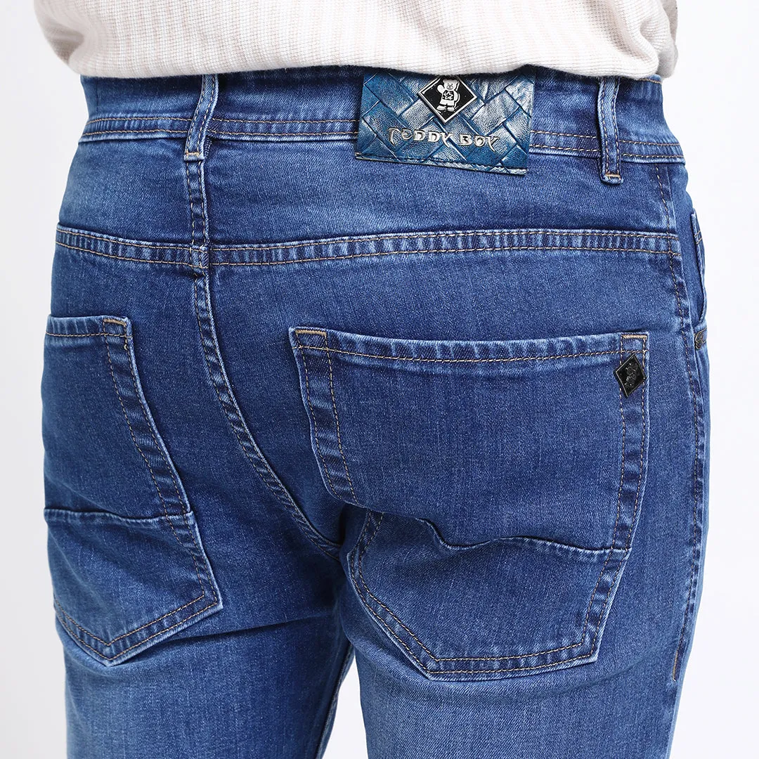 ANKLE DARK BLUE FIT JEANS