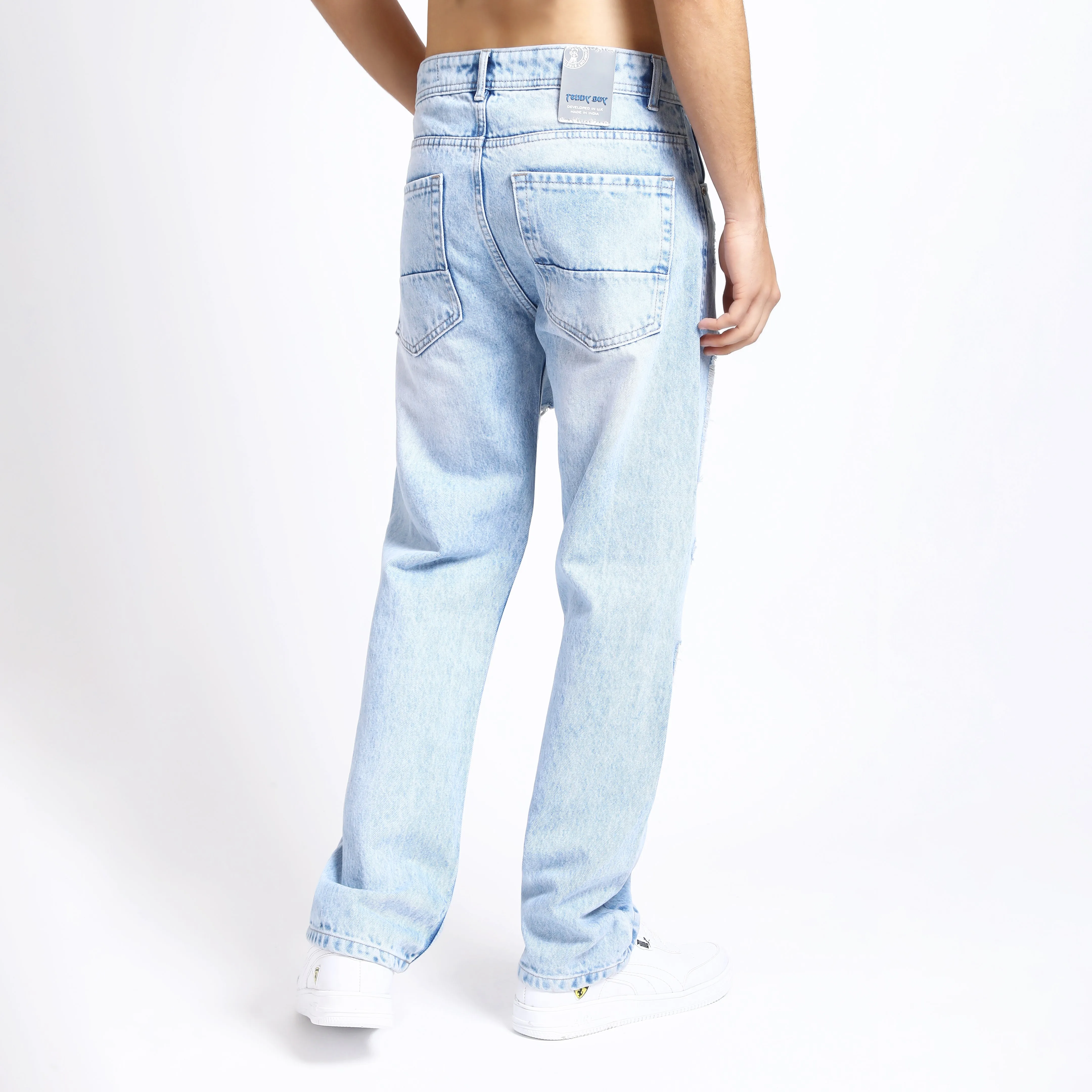ICE BLUE BAGGY FIT DISTRESSED JEANS TEDDY